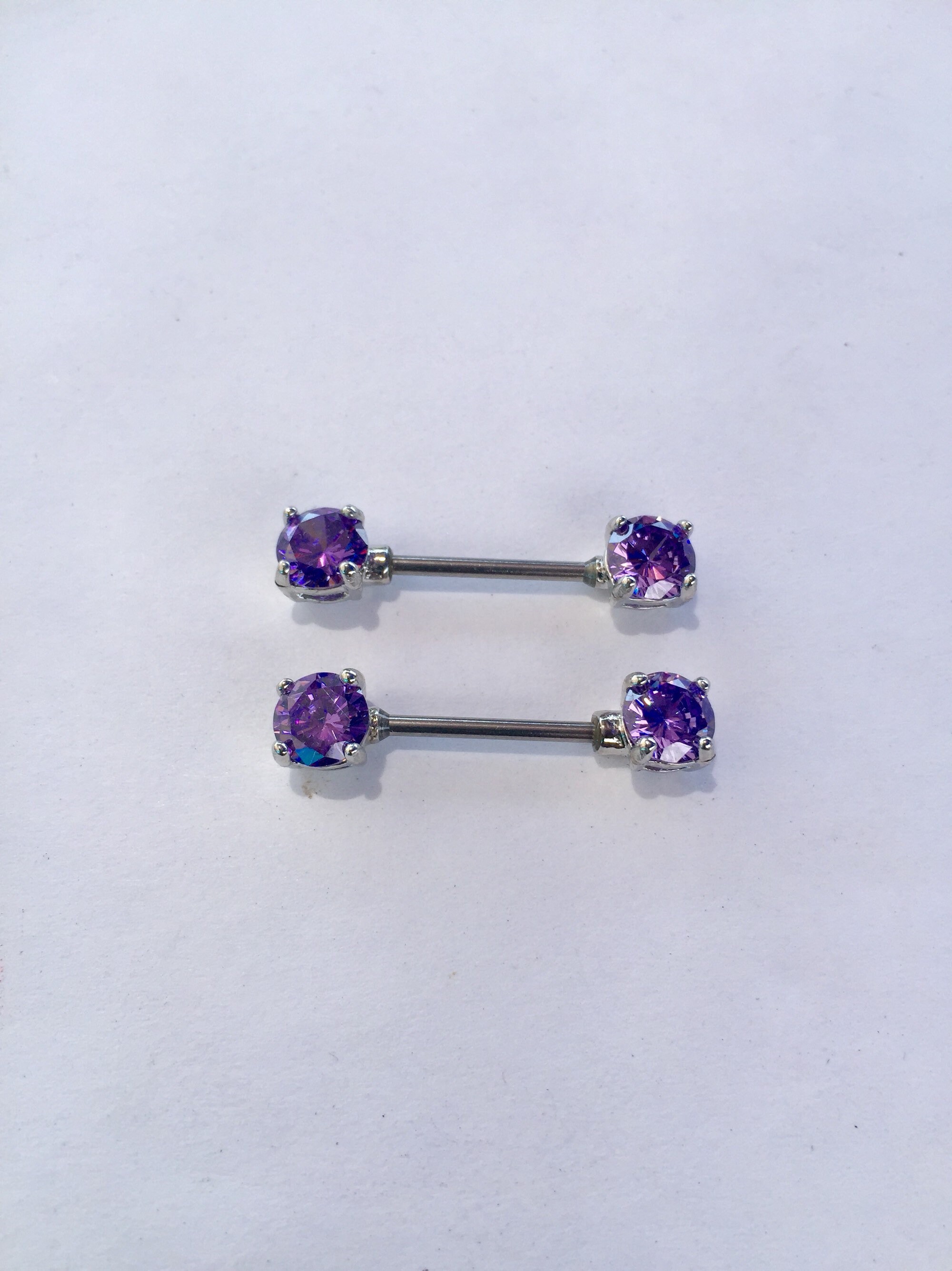 Purple nipple rings deals