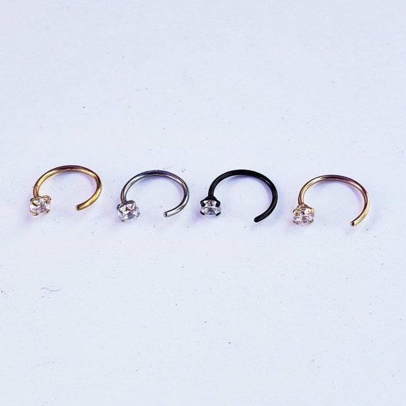 Steel nose piercing – half-arch adorned with tiny zircons, glossy beads |  Jewelry Eshop
