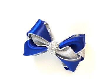 This pretty blue /silver HairBow is attached to a good quality alligator clip