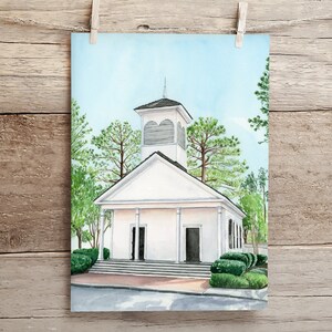 May include: Watercolor painting of a white church with a steeple and a bell tower. The church is surrounded by green trees and bushes. The church has a white door and windows. The painting is done in a realistic style.
