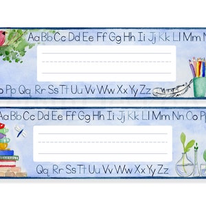 May include: Two blue and white printable name tags with watercolor illustrations. The top tag features a cardinal bird on a branch and a feather. The bottom tag features a stack of books, a dragonfly, and a vase with plants. Both tags have the alphabet printed on them.  Aa Bb Cc Dd Ee Ff Gg Hh Ii Jj Kk Ll Mm Nn Oo Pp Qq Rr Ss Tt Uu Vv Ww Xx Yy Zz