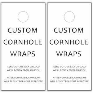 May include: Two white rectangular signs with black text that reads "CUSTOM CORNHOLE WRAPS". The text below reads "SEND US YOUR IDEA OR LOGO WE'LL DESIGN FROM SCRATCH! AFTER YOU ORDER, A MOCK UP WILL BE SENT FOR YOUR APPROVAL!"