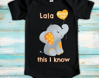 May include: Black baby onesie with an orange and gray elephant holding a balloon that says "lala loves me this I know".