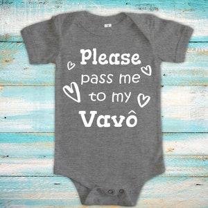 May include: Gray baby onesie with white text that reads "Please pass me to my Vavó" with hearts around the text.