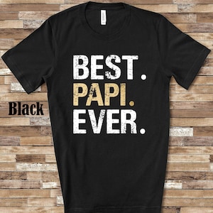 May include: Black t-shirt with white distressed text that reads "BEST. PAPI. EVER."