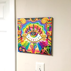May include: A colorful abstract painting of an eye with rainbow colors and geometric patterns. The eye is surrounded by swirls and other abstract shapes.
