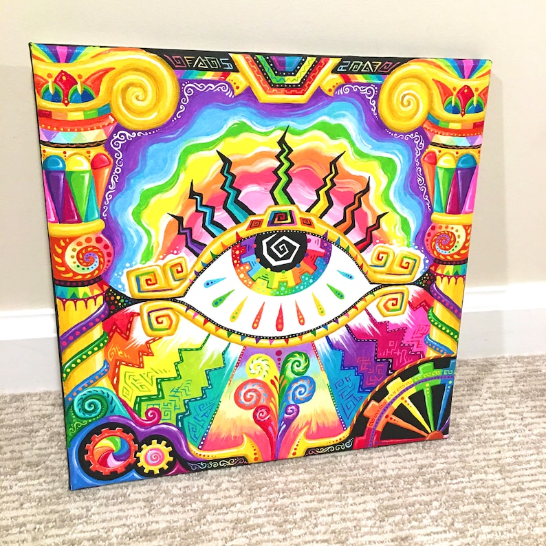 May include: A colorful abstract painting on canvas featuring a large eye with a rainbow iris and a black pupil. The eye is surrounded by geometric shapes and swirls in shades of yellow, orange, red, pink, blue, green, and purple.