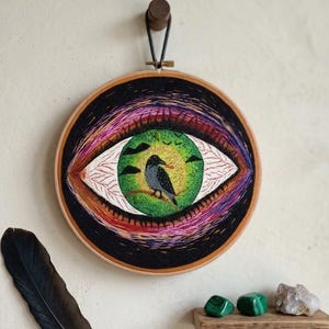 Hand Embroidered Mystic Eye: The Crow and the Seed wall decor (12'')