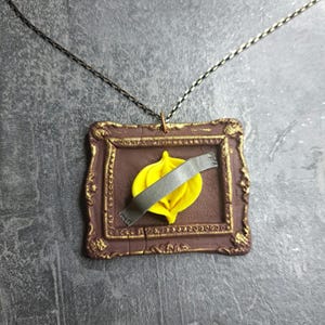 Duct-Taped Vulva Necklace – Satirical Feminist Statement Jewelry