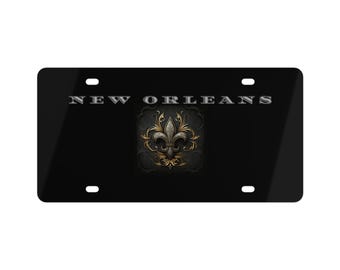 Placa de matrícula negra y dorada con diseño de flor de lis de Nueva Orleans
