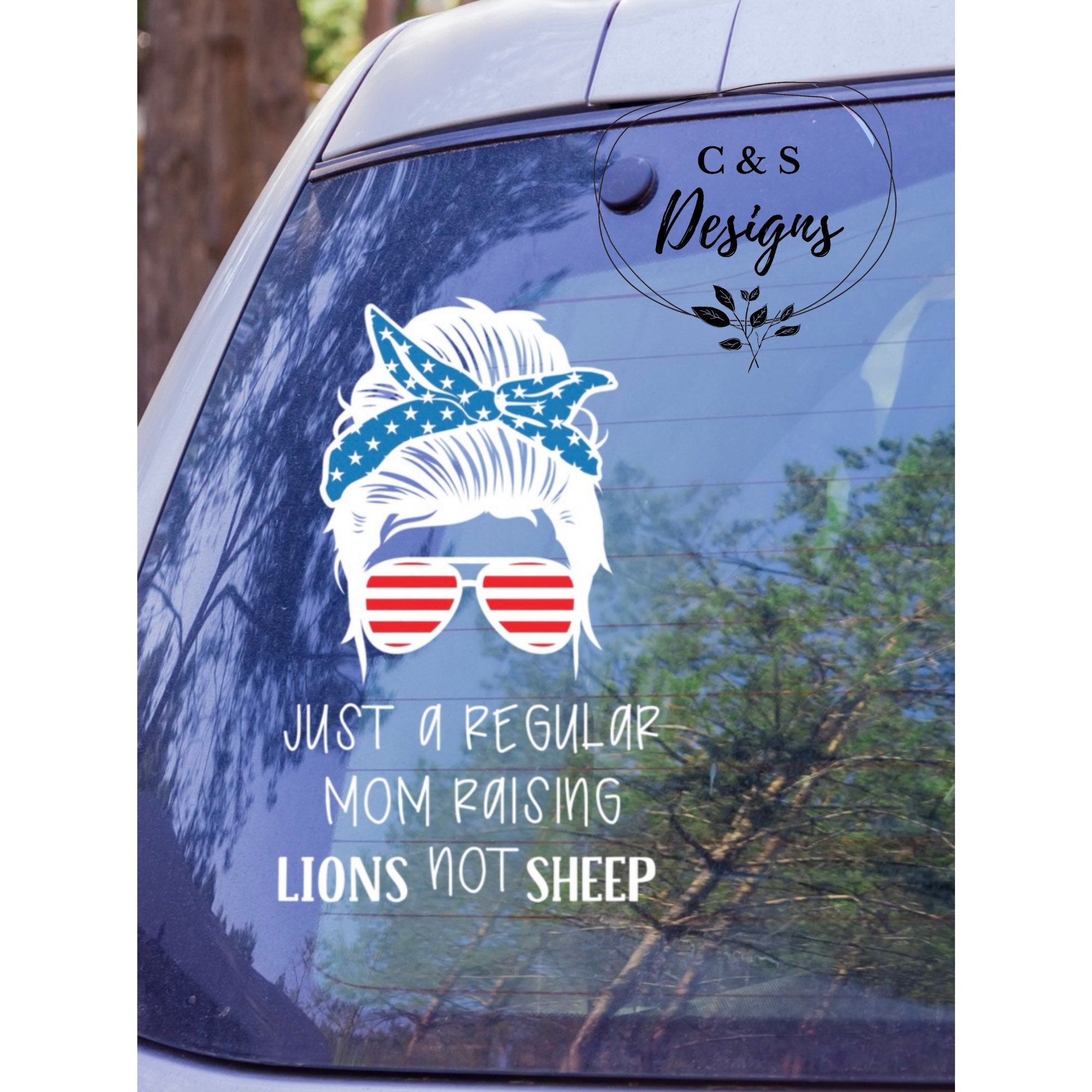 Just A Regular Mom Raising Lions Not Sheep window Decal