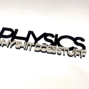 May include: A sign with the words "PHYSICS WHY SHIT DOES STUFF". The word "PHYSICS" is in black, and the phrase "WHY SHIT DOES STUFF" is in white. The sign is on a white background.