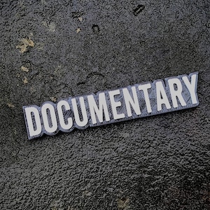 Documentary video shelf sign