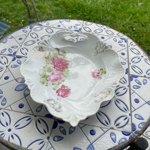 Turn of the century porcelain dish with roses and gold trim. Made in Germany.