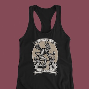 May include: Black tank top with a graphic of a devil riding a bicycle with wine bottles in a basket. The text "Drink Wine Hail Satan!" is printed on the shirt.