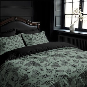 May include: A bed with a black headboard and bedding. The duvet cover and pillowcases feature a light green background with a repeating pattern of black insects. The top sheet is solid black.