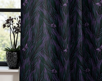 May include: Purple butterflies fly among dark green leaves on a black background. This is a fabric print design.