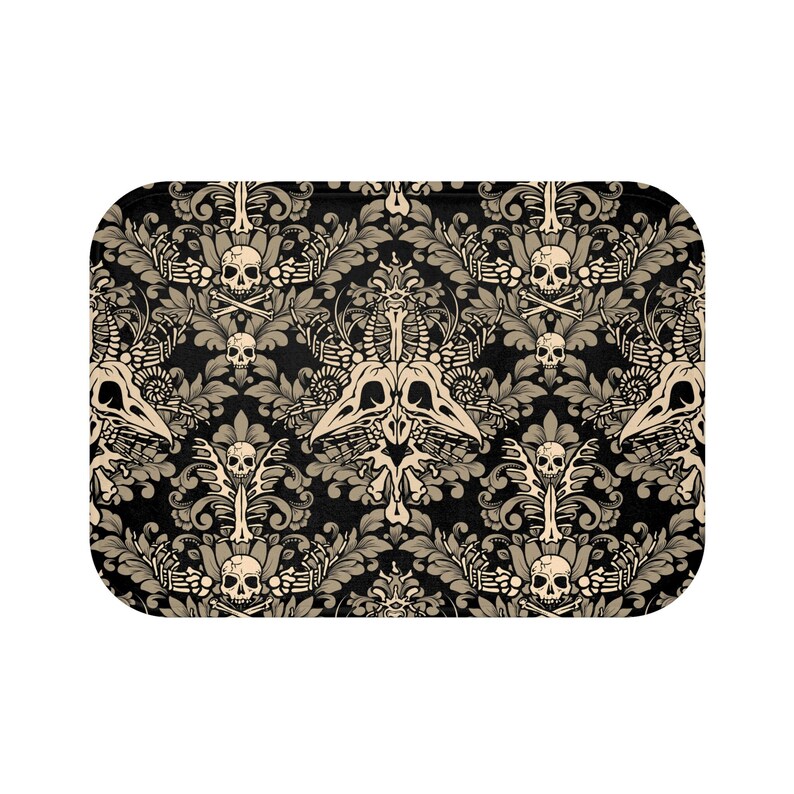 May include: A black and beige patterned tray with a skull and crossbones design. The tray has a damask pattern with floral elements and skeletal motifs.