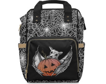 Halloween Diaper Backpack, Bat & carved pumpkin nappy bag w/ abstract gothic spider web pattern. A spooky gift for a goth mom's baby shower