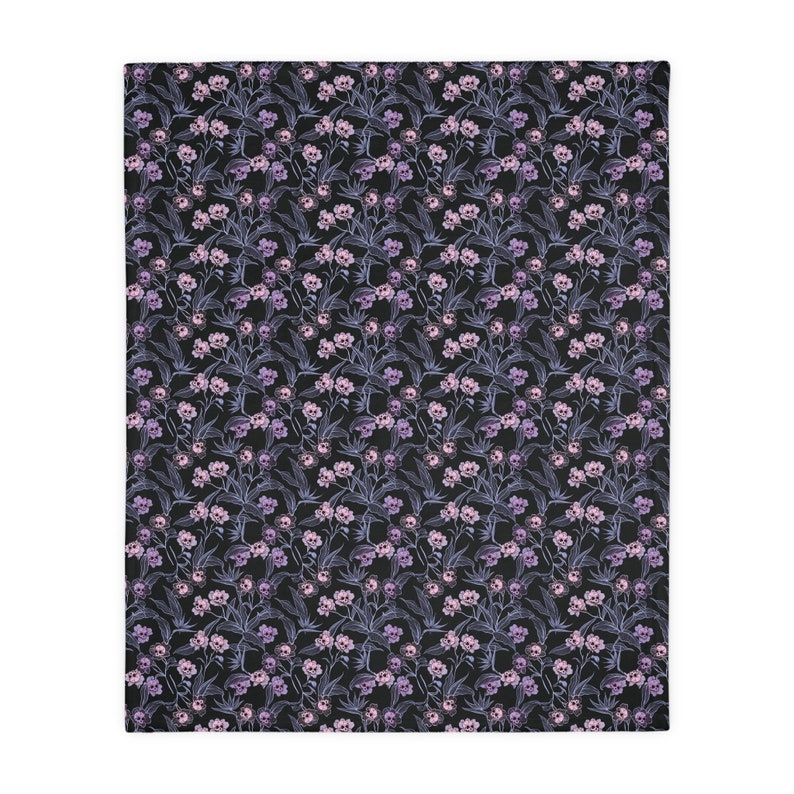 Pastel goth blanket w/ purple, pink & blue skull flowers and soft lilac minky back. A spooky nursery decor gift for the witchy gothic mom image 2