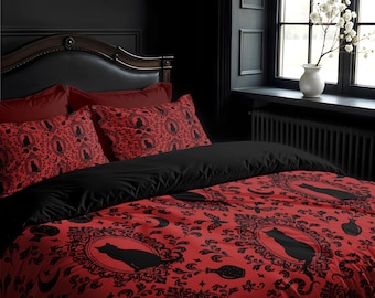 May include: Red and black bedding set featuring a black cat and floral design. The set includes a duvet cover, two pillowcases, and a fitted sheet.