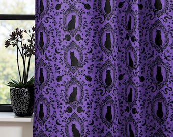 May include: Purple curtain with a repeating pattern of black cat silhouettes in ornate frames, along with crescent moons, butterflies, and swirling designs. The curtain is hanging in front of a window with a potted plant.