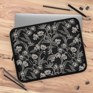 Gothic Floral Laptop Sleeve, Spooky tiki skull flower protective tablet computer case in black & cream. Macabre gift for goth entrepreneur