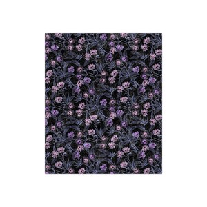 Pastel goth blanket made of crushed velvet showing the entire blanket. Blanket has pink, purple and blue skull flowers.