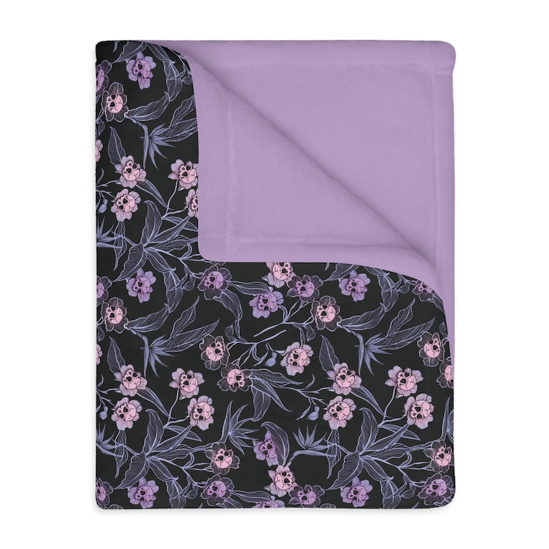Pastel goth blanket w/ purple, pink & blue skull flowers and soft lilac minky back. A spooky nursery decor gift for the witchy gothic mom image 1