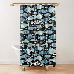May include: A black shower curtain with a repeating pattern of blue and green fish. The fish are stylized and have different shapes and sizes.