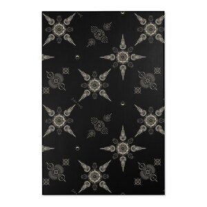 May include: Black and white geometric pattern with a repeating design of stars and circles. The pattern is on a black background.