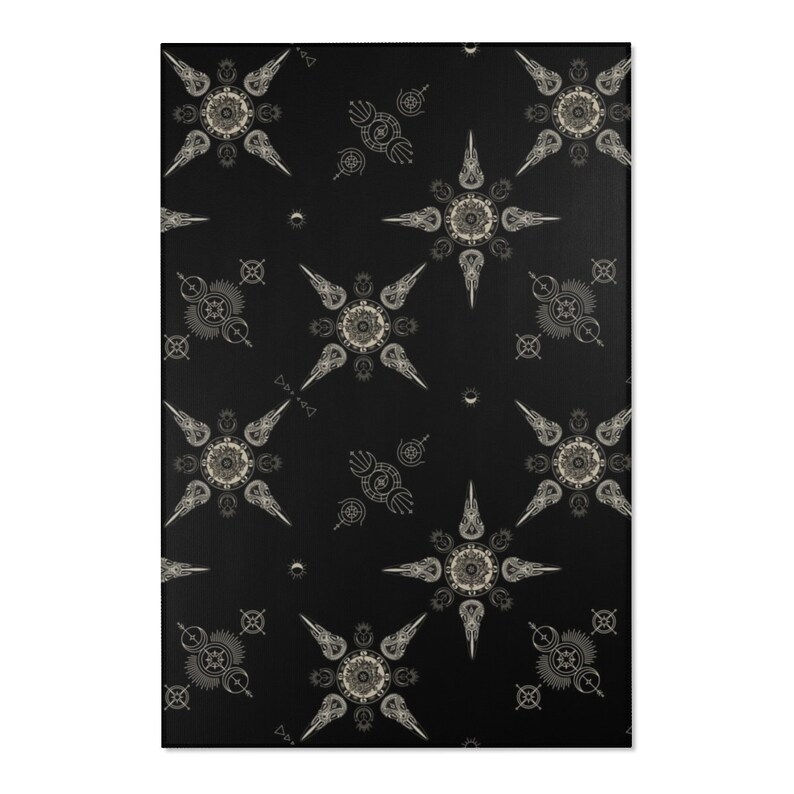 May include: Black and white geometric pattern with a repeating design of stars and circles. The pattern is on a black background.