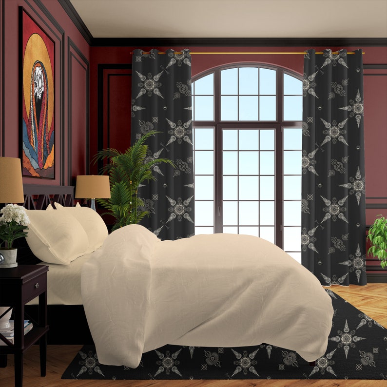 May include: A bedroom with a bed with white bedding and a black and white patterned rug. The room has dark red walls and black curtains with a white geometric pattern. There is a window with a view of a blue sky.