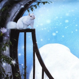 May include: A white squirrel sits on a black railing with a blue and white background. The background has a snowy, wintery feel with white snowflakes on a light blue sky.