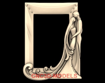 May include: A beige wooden picture frame with a carved design of a couple embracing. The frame has a rectangular opening for a photo and is decorated with small, round embellishments.