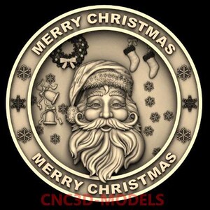 May include: A round, cream-colored ornament with a raised, detailed image of Santa Claus. The ornament has a gold border with the text "Merry Christmas" repeated twice.