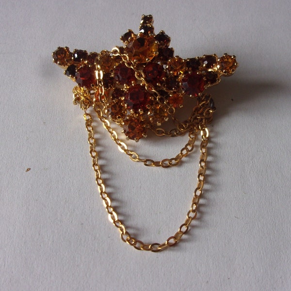 Broche forme barrette strass et chainettes ,broche strass orangés