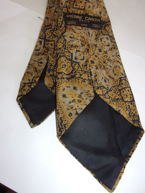 Vintage tie labels Schiaparelli , Pierre Cardin, Yves Saint