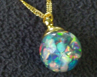 large floating opal necklace pendant  glass globe opals float like a snow globe  gold filled chain