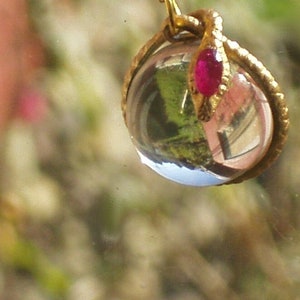 rock crystal ruby snake pendant necklace pools of light snake wrapped