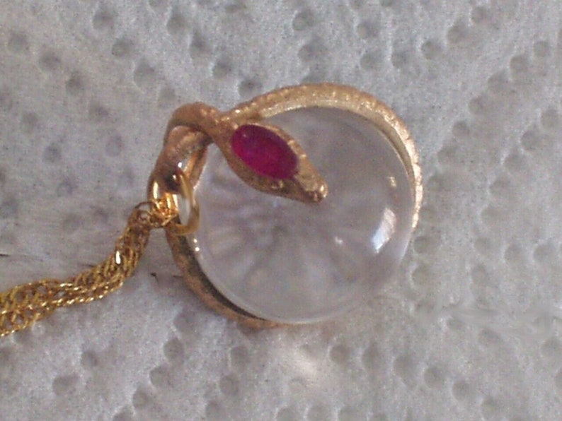 rock crystal ruby snake pendant necklace pools of light snake wrapped