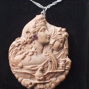 cameo eos and nyx goddesses of day and night accompanied by zeus in the form of an eagle and an owl ruby earring necklace pendant