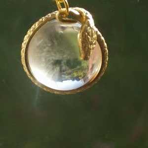 pools of light snake wrapped rock crystal pendant necklace quartz gold filled chain