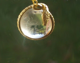 pools of light snake wrapped rock crystal pendant necklace quartz gold filled chain