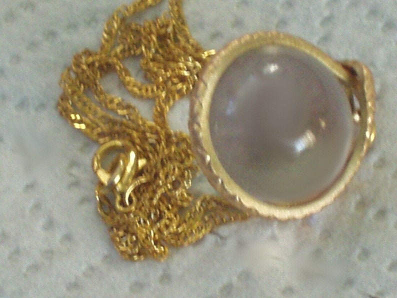 rock crystal ruby snake pendant necklace pools of light snake wrapped