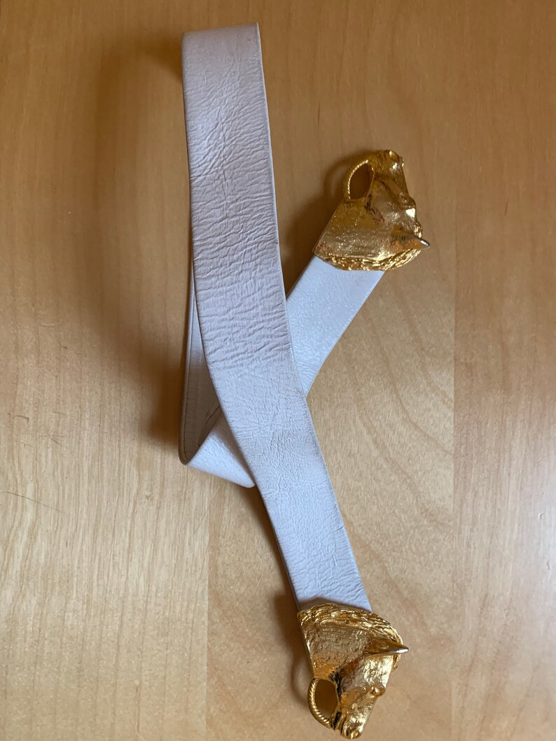 Vintage SAKS FIFTH AVENUE horse head leather belt