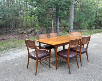 Mid Century Drexel Parallel Dining Set  with six cane back chairs and two leaves