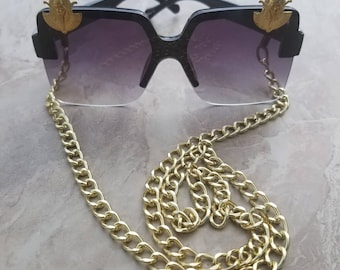 Rökfärgade Funshades, Afrocentriska Urbana Solglasögon, Egyptiskinspirerade Solglasögon, Afropunk Festival Solglasögon med Kedja, Statementglasögon