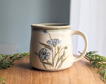 Small handmade pottery flower mug, ceramic coffee or tea cup, wheel thrown mug for gardener, bachelor button, wildflower, 10 ounce coffee