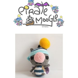May include: A handmade crochet Pirate Moogle doll with a yellow pom-pom, blue and white striped body, and a pink nose. The doll has a blue and white striped bandana and small purple wings. The image also includes the text "Pirate Moogle".